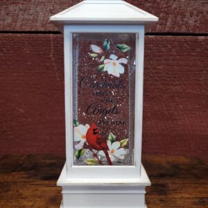 Lighted lantern displaying "Cardinals are near when angels are near"