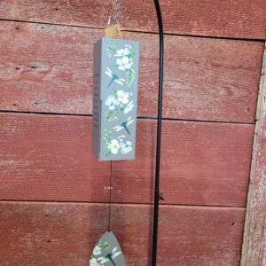 Sturdy windchime that displays " May the winds of heaven blow softly and whisper in your ear, how much we love and miss you and wish that you were here"